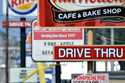 Fast food restaurant signs line Peach Street in Erie, Pa