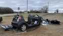 In this image provided by KFOR-TV, a heavily damaged vehicle is seen off a road in Tishomingo, Okla…