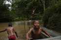 Children in El Jobo village play in the Indio River, which could have its flow reduced under a prop…