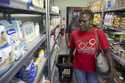 Jeanne Musaga shops at a social group store, Tuesday, August 6, 2024, during the 2024 Summer Olympi…