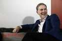 Netflix founder and CEO Reed Hastings smiles during an interview in Barcelona, Spain, February 28, …