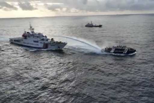 In this image made from a video provided by the National Task Force for the West Philippine Sea…