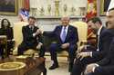 France's President Emmanuel Macron, from second left, speaks with President Donald Trump as Vice Pr…