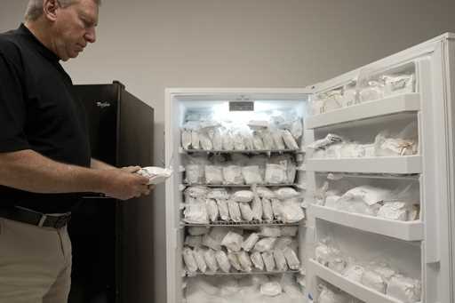David Ayares, president and chief scientific officer of Revivicor, holds a package of frozen meat d…
