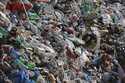 Garbage collected en route to Mount Everest is piled before it is sorted for recycling at a facilit…