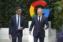 Google and Alphabet CEO Sundar Pichai, left, and Poland's Prime Minister Donald Tusk, right, meet f…