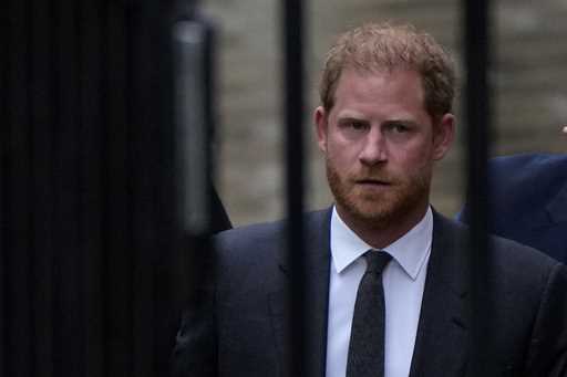 Britain's Prince Harry arrives at the Royal Courts Of Justice in London, Tuesday, March 28, 2023