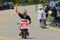 Lear production worker Abigail Fletcher rides her mini bike in support of the picket line as member…