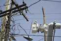 A brigade from the Electric Power Authority repairs distribution lines damaged by Hurricane Maria i…