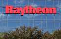 The sky is reflected on the facade of Raytheon's Integrated Defense Systems facility, Monday, June …