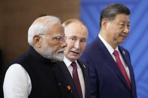 From left, Indian Prime Minister Narendra Modi, Russian President Vladimir Putin and Chinese Presid…