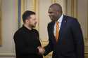 Britain's Foreign Secretary David Lammy is greeted by Ukraine's President Volodymyr Zelenskyy durin…