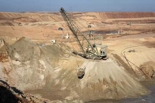 An aerial view of an ilmenite open pit mine in a canyon in the central region of Kirovohrad, Ukrain…