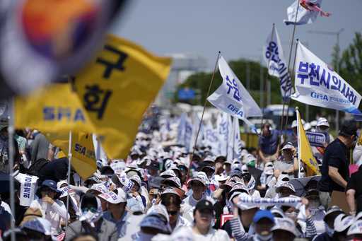 Members of The Korea Medical Association attend at a rally against the government's medical policy …