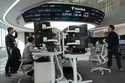 Currency traders work at the foreign exchange dealing room of the KEB Hana Bank headquarters in Seo…