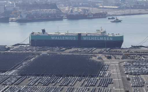 Vehicles are parked to be exported at a port next to Hyundai Motor's manufacturing facility in Ulsa…