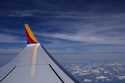 A Southwest Airlines Boeing 737 Max 8 passenger jet flies over the central United States heading fo…