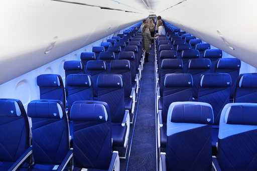 Guests tour a retrofitted Southwest Airlines passenger jet at Love Field ,Thursday, Sept