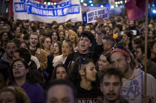 Demonstrators march to protest the skyrocketing cost of renting an apartment in Barcelona, Spain, S…