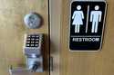 Passcode lock is seen at a restroom door in a Starbucks in Glenview, Ill