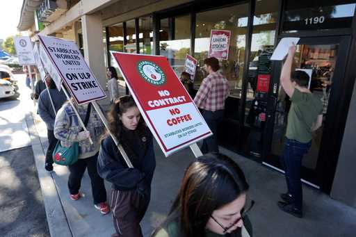 Starbuck workers picket outside of a closed Starbucks on Friday, December 20, 2024, in Burbank, Cal…