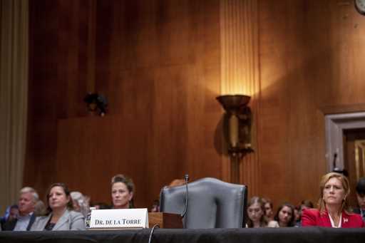 The chair reserved for Steward Health Care System CEO Ralph de la Torre sits empty after de la Torr…