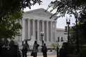 People walk past the Supreme Court on Thursday, June 27, 2024, in Washington