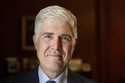 Supreme Court Justice Neil Gorsuch poses for a portrait in his office at the Supreme Court, Monday,…