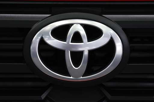 A Toyota logo is shown at the North American International Auto Show in Detroit, Sept