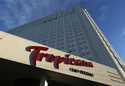 Sunlight illuminates a sign at the Tropicana hotel and casino on August 4, 2015, in Las Vegas