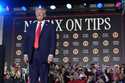 President Donald Trump talks with Nevada Republican Party chairman Michael McDonald, left, and Neva…