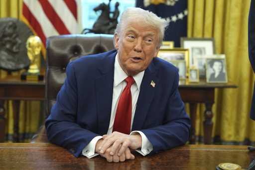 President Donald Trump speaks after signing an executive order in the Oval Office of the White Hous…