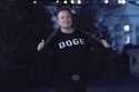 Elon Musk flashes his t-shirt that reads "DOGE" to the media as he walks on South Lawn of the White…