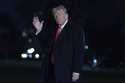 President Donald Trump waves to the media as he walks on the South Lawn of the White House, in Wash…