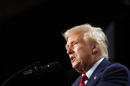 President Donald Trump arrives to speak at the 2025 House Republican Members Conference Dinner at T…