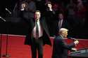 Elon Musk reacts as President-elect Donald Trump speaks at a rally ahead of the 60th Presidential I…