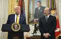 President Donald Trump speaks during a ceremonial swearing-in for Secretary of Commerce Howard Lutn…