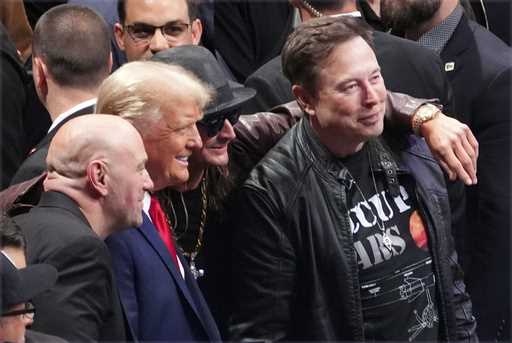 President-elect Donald Trump poses for a photo with Dana White, Kid Rock and Elon Musk at UFC 309 a…