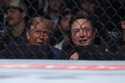 President-elect Donald Trump looks on with Elon Musk, right, at a UFC 309 mixed martial arts flywei…