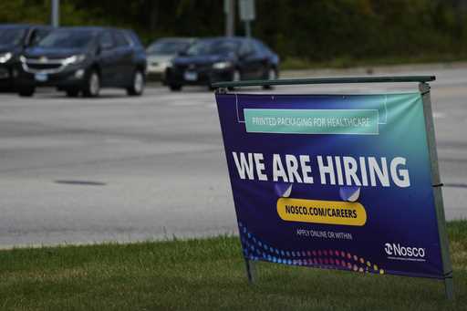 A hiring sign is seen in Waukegan, Ill., on Sept. 28, 2024. (AP Photo/Nam Y. Huh, File)