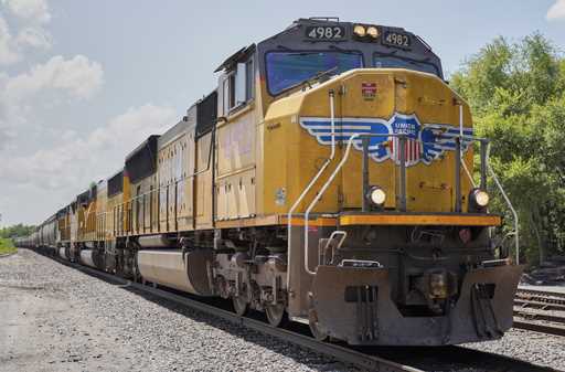 In this July 31, 2018, file photo a Union Pacific train travels through Union, Neb