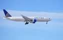 A United Airlines jetliner glides in for a landing at Denver International Airport on January 16, 2…