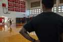 TJ Rickard, Lahainaluna High School boys basketball coach, watches his players warm up at Lahainalu…