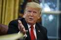 President Donald Trump speaks during an interview with The Associated Press in the Oval Office of t…