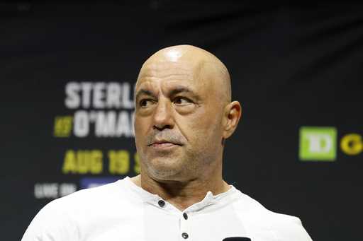 Joe Rogan looks on at the ceremonial weigh-in for the UFC 292 mixed martial arts event, August 18, …