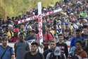 A migrant caravan departs from Tapachula, Mexico, December 24, 2023, on their journey north through…