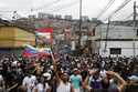 Protesters demonstrate against the official election results declaring President Nicolas Maduro won…