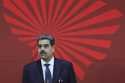 Venezuelan President Nicolas Maduro waits to receive attendees at the start of the Bolivarian Allia…