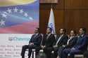 Chevron President in Venezuela, Javier La Rosa, left, attends a signing agreement ceremony between …