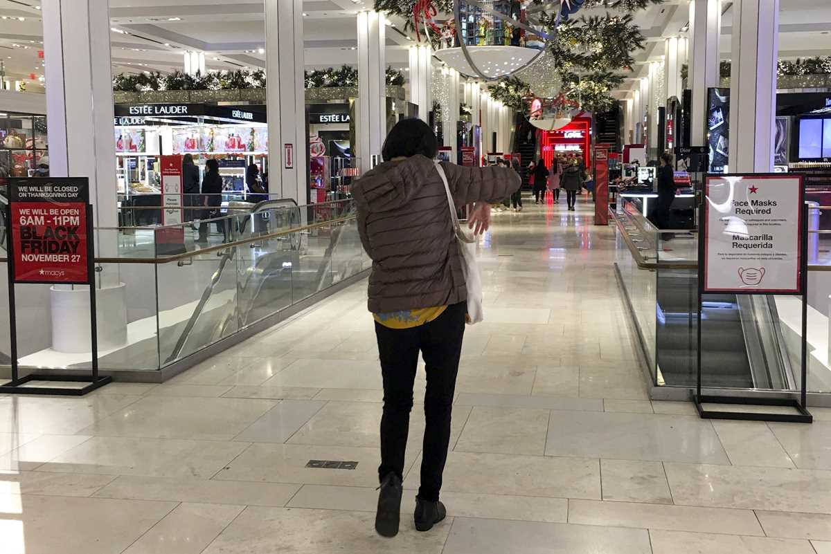 Virus keeps Black Friday crowds thin, shoppers shift online | MarketBeat